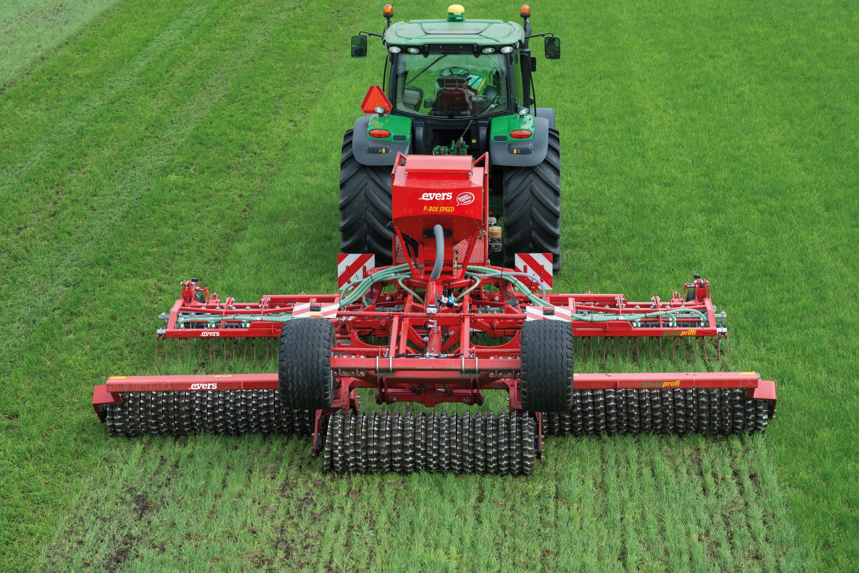 Carrying out harrowing and sowing grassland in one pass.The difference between before and after cultivation is clearly visible